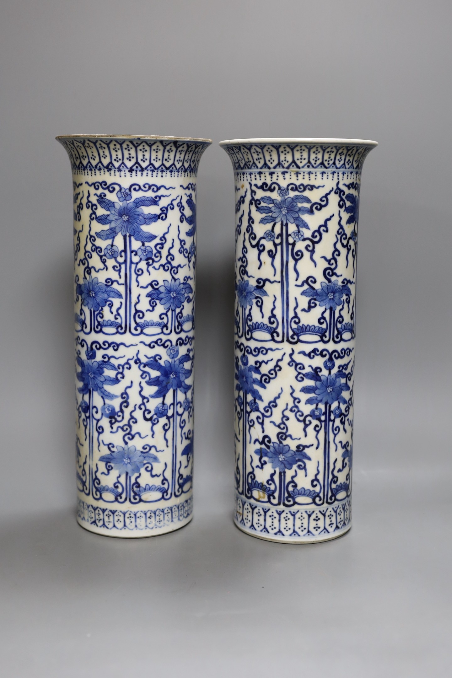 A pair of 19th century Chinese blue and white sleeve vases 30.5cm